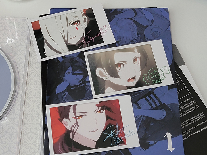 A photograph three bonus character cards included as limited extras.