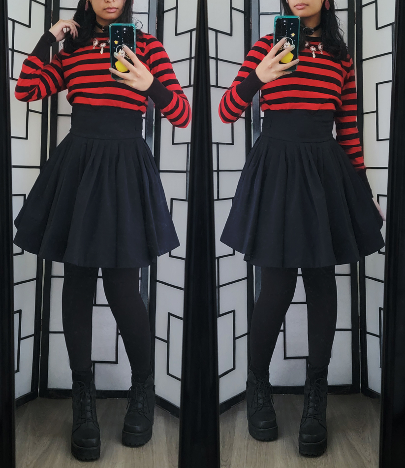 Red and black dark outfit featuring red/black stripe shirt and eyeball oracle necklace.