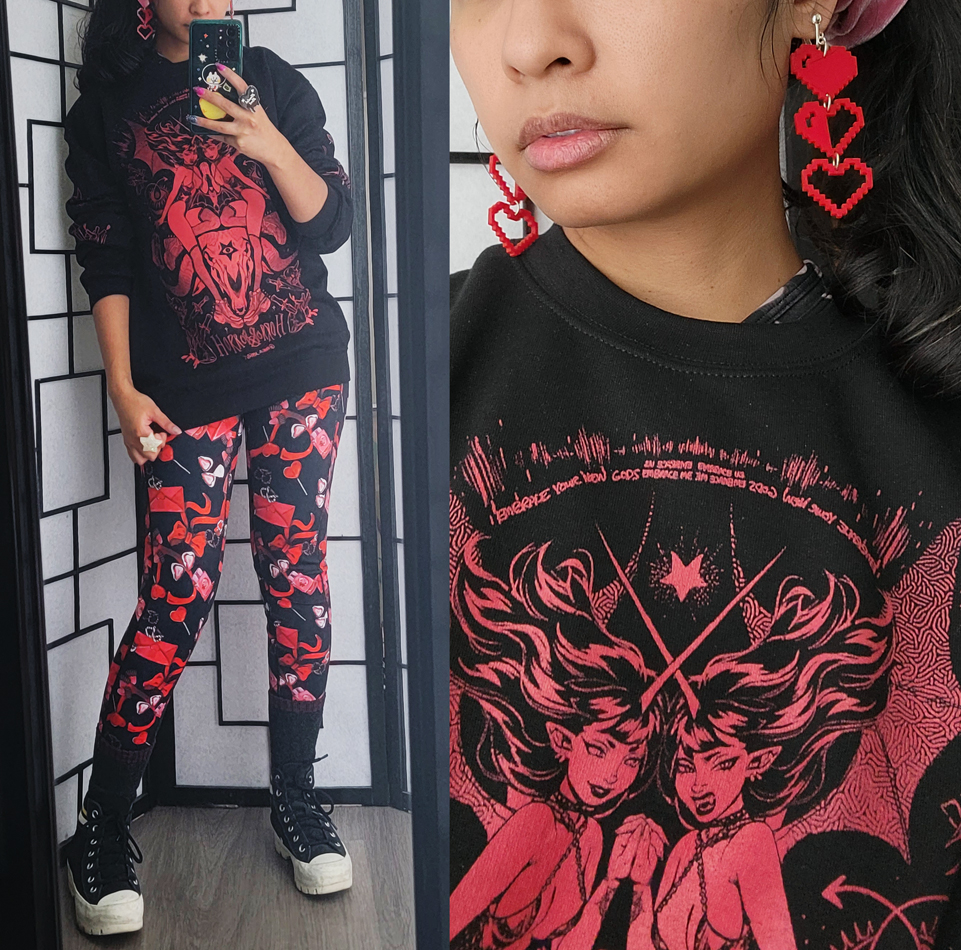 Simple black and red outfit featuring an illustrated crewneck of demon girls and valentines chocolate themed leggings.