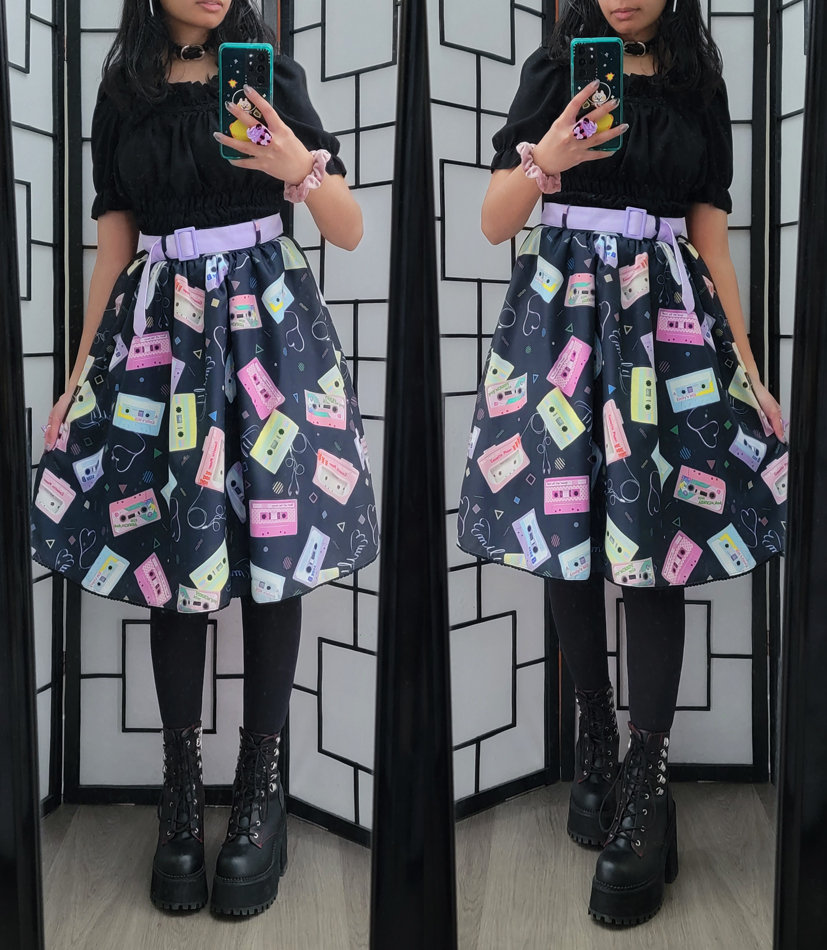 Black and colorful pastel coordinate featuring a cassette tape print skirt.