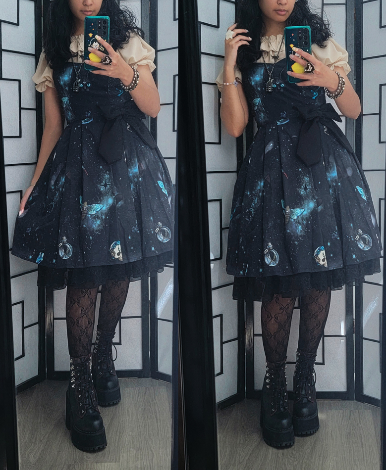 A dark grey, black, turquoise, and beige coordinate with a galaxy and witch-themed dress.
