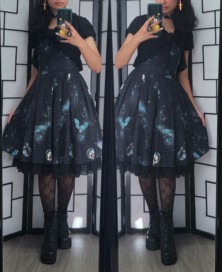 A dark grey, black, and turquoise coordinate with a galaxy and witch-themed dress.