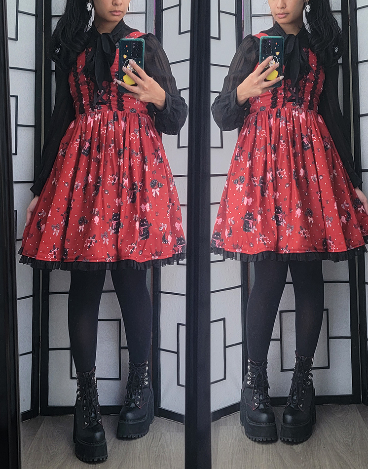 A gothic lolita coordinate with a red gothic and cat themed dress.