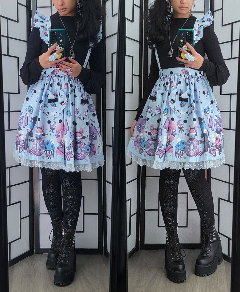 A creepy cute pastel blue and black lolita fashion coordinate with a halloween themed print.