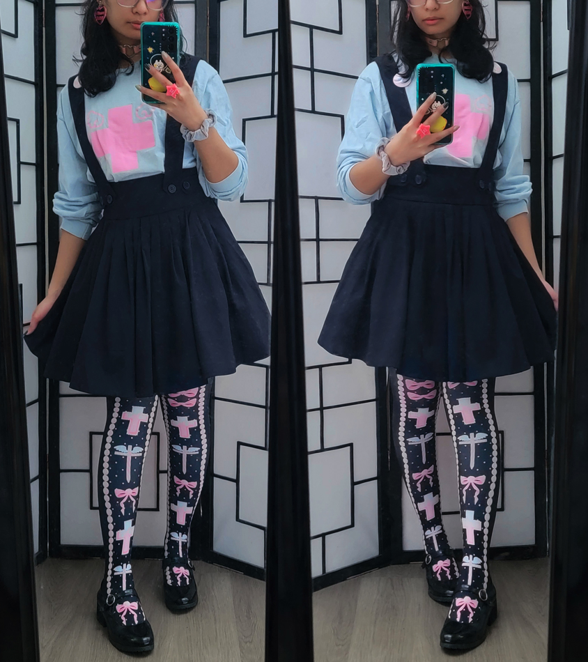 Variation of a pastel blue, pink, and navy outfit with cross motifs.