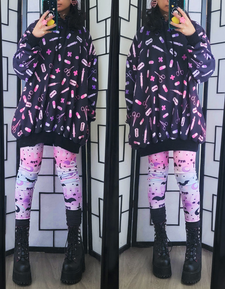 Black and pastel outfit with menhera and pastel goth pattern prints.