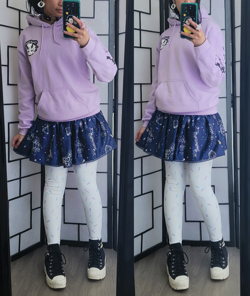 Lavender, white, and navy outfit with constellation and candy sprinkle patterns.