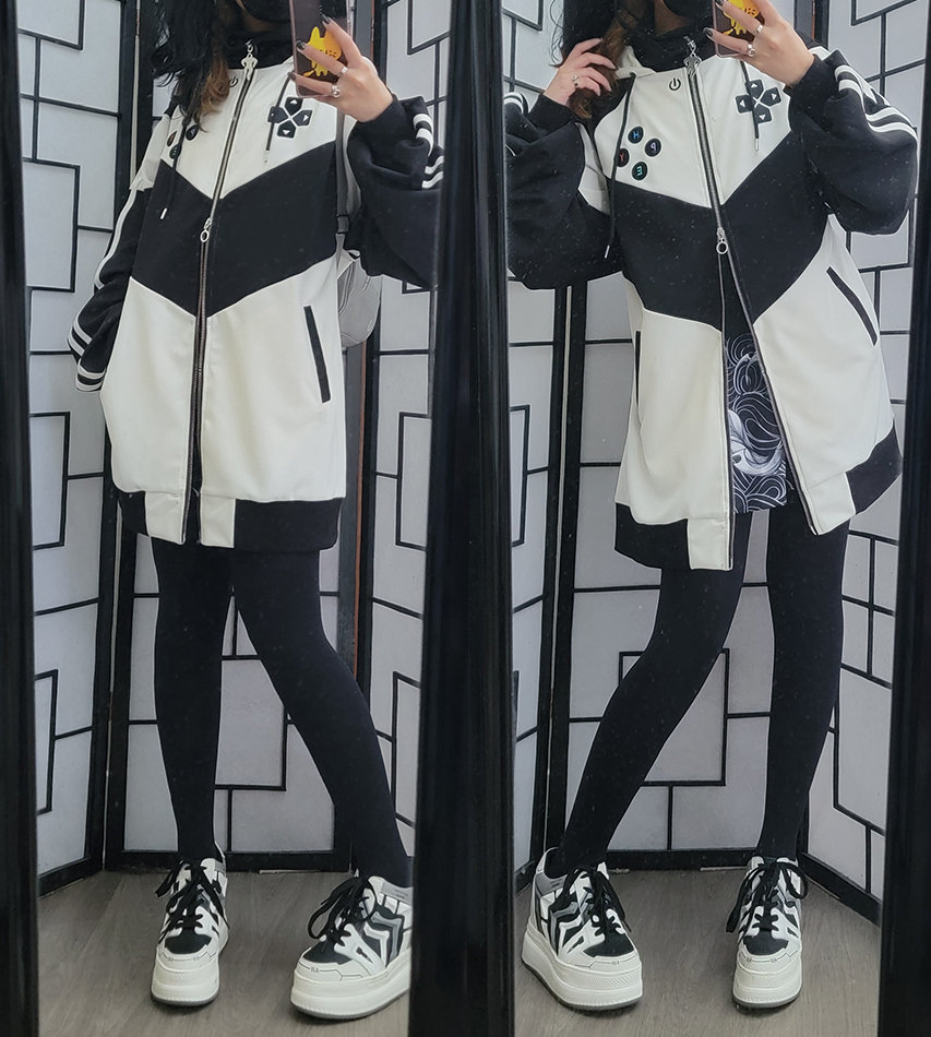 Casual black and white outfit featuring an oversized gaming console themed zip jacket.