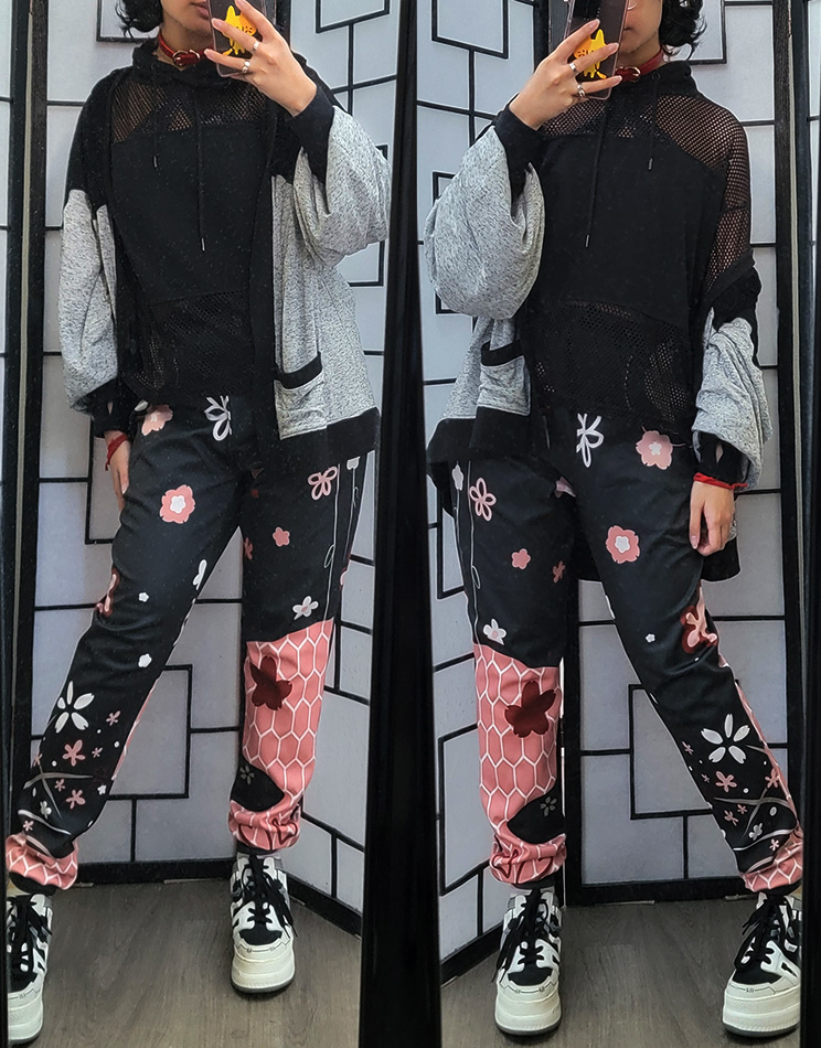 A pink, black, and grey casual outfit featuring floral print joggers.