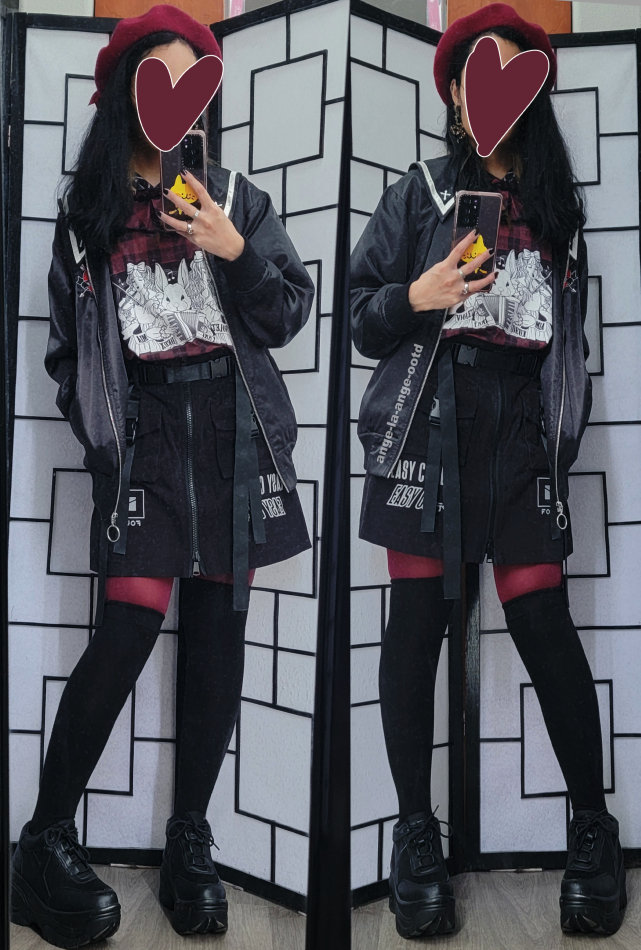 A red and black outfit featuring a red plaid top and a black techwear skirt.