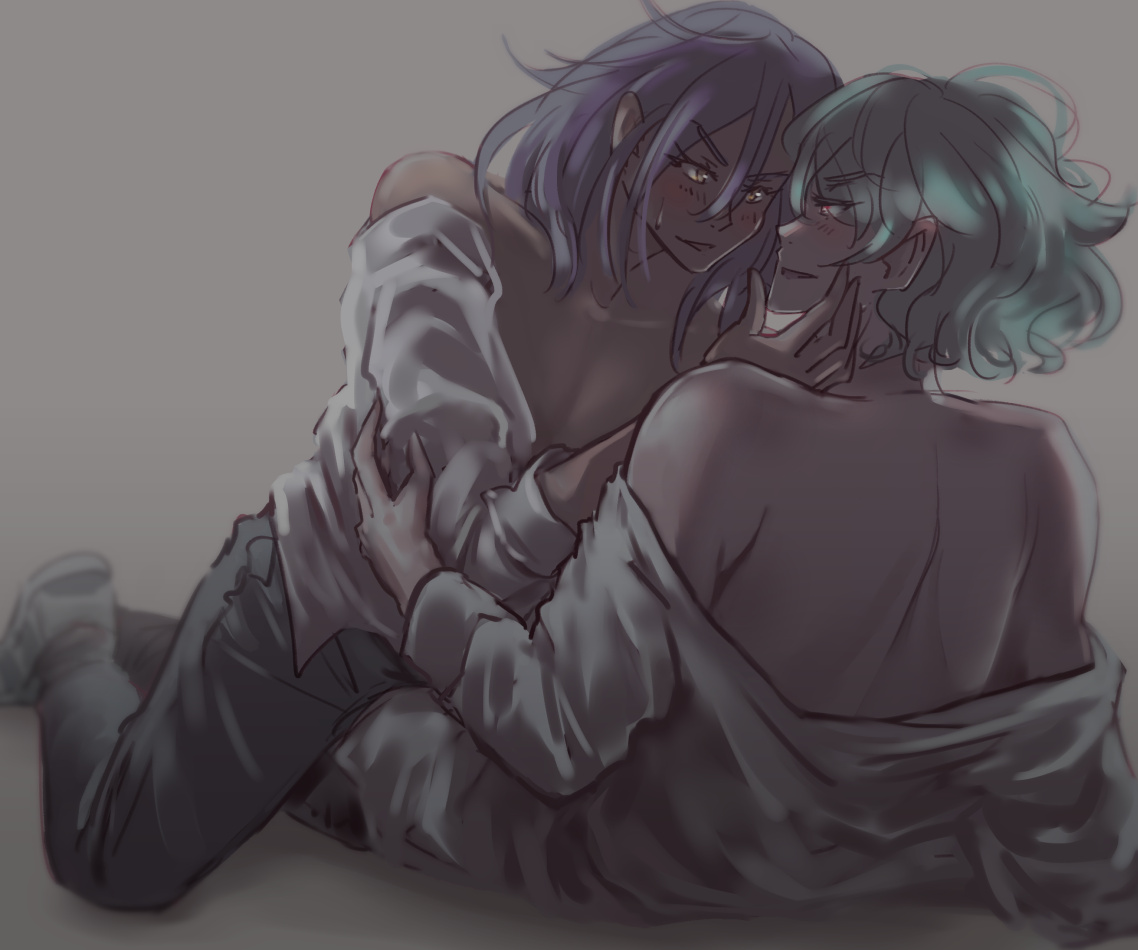 Nao and Takeru in a suggestive position half sitting up on the floor. Both of their shirts are partially off.